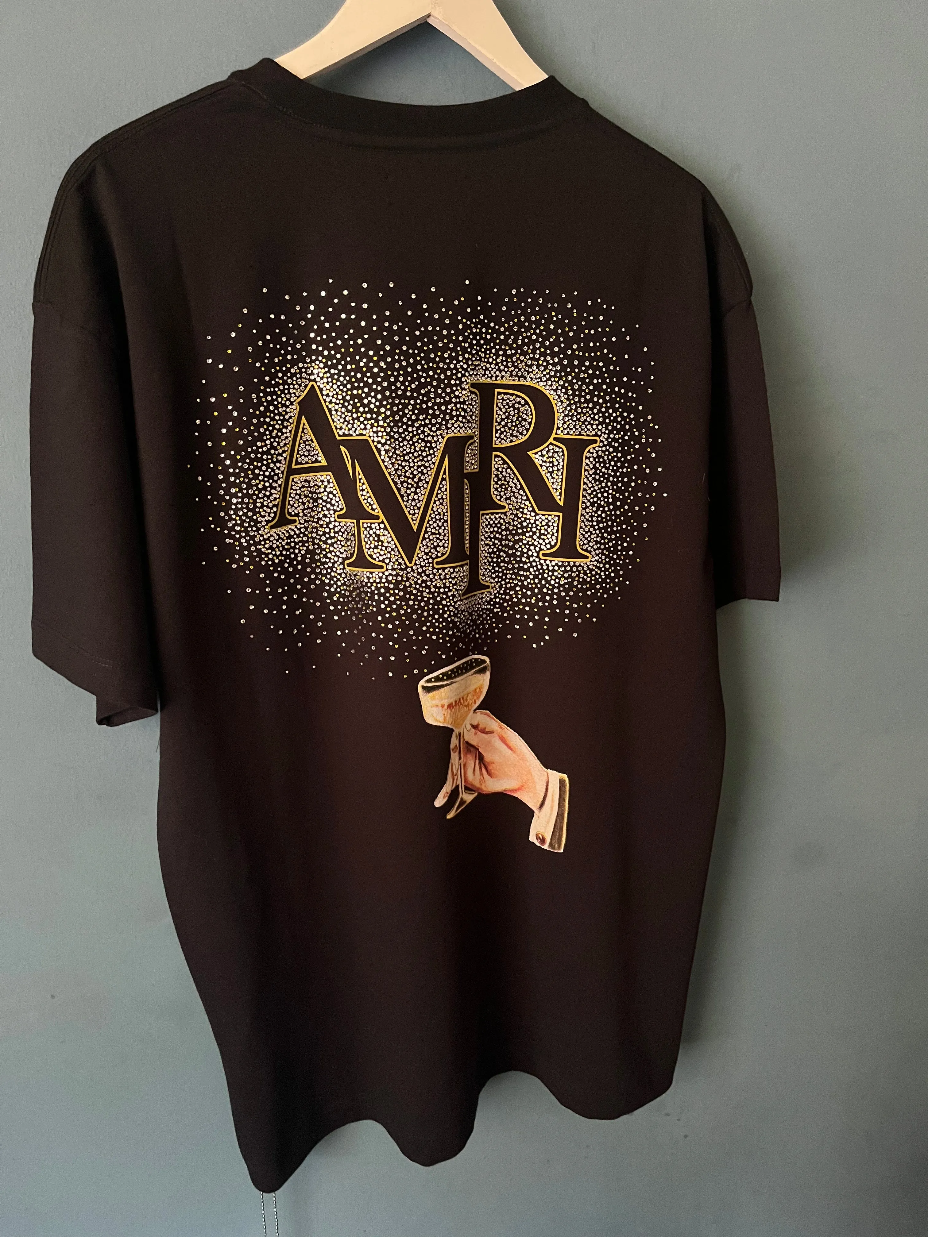 AMIRI "Champagne " Cotton T-shirt Styled in Black for Spring&Summer 2024